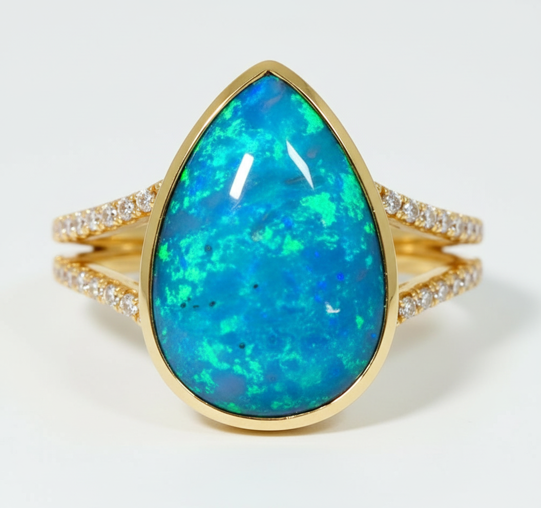 Pear opal ring with split shank